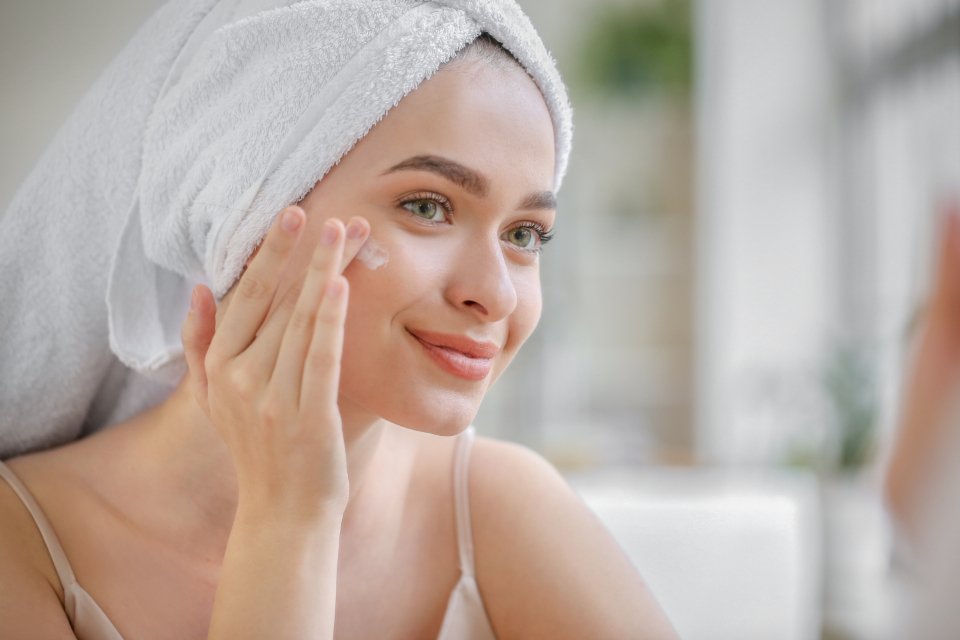 Smiling woman with glowing skin