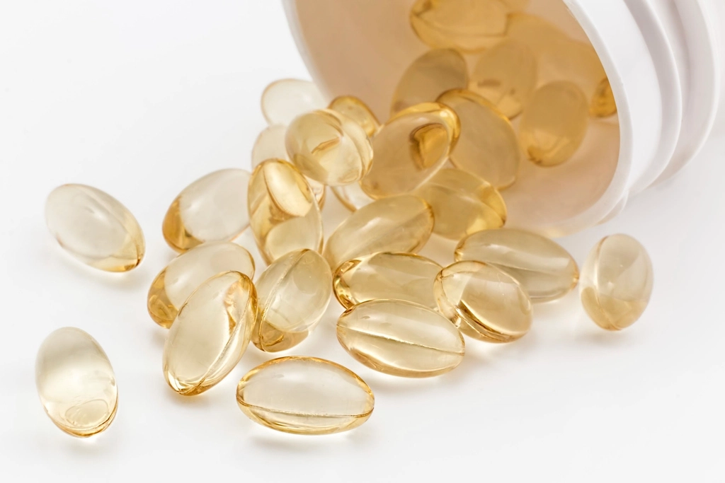 Golden supplement softgels